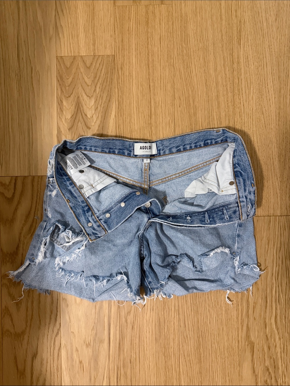 Agolde Light Wash Distressed Denim Cutoff Shorts